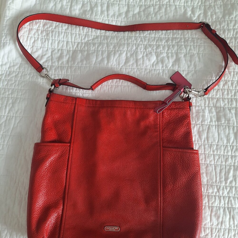 Coral Coach crossbody bag